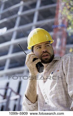 industry, construction, talking, worker, Middle-aged, radio View Large Photo Image Stock Photo - industry, construction, talking, worker, Middle-aged, radio. Fotosearch