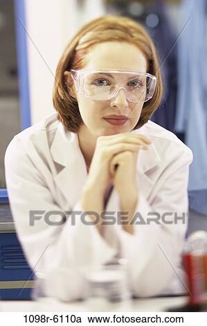 Stock Image - industry, woman, scientist, researcher, indoors, redhead, occupation. Fotosearch