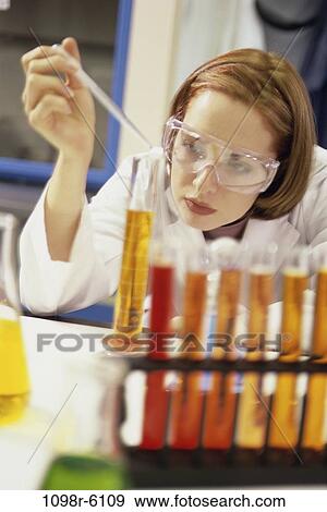 industry, woman, testing, scientist, research, serious, researcher View Large Photo Image Stock Photo - industry, woman, testing, scientist, research, serious, researcher. Fotosearch