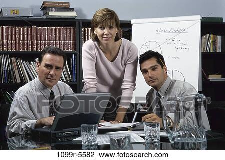 meeting, computer, laptop, business, Middle-aged, using, casual View Large Photo Image Stock Image - meeting, computer, laptop, business, Middle-aged, using, casual. Fotosearch