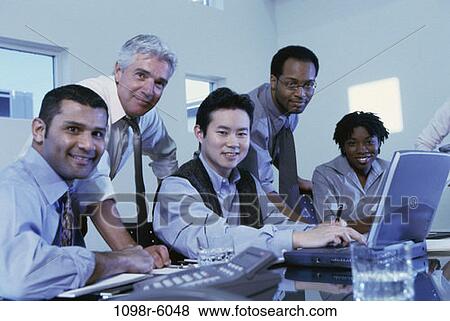 meeting, multiethnic, laptop, business, Middle-aged, teamwork, indoors View Large Photo Image Stock Photo - meeting, multiethnic, laptop, business, Middle-aged, teamwork, indoors. Fotosearch