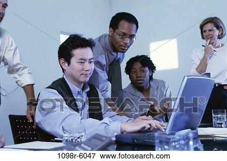 meeting, multiethnic, presentation, laptop, business, Middle-aged, indoors View Large Photo Image Stock Photo - meeting, multiethnic, presentation, laptop, business, Middle-aged, indoors. Fotosearch