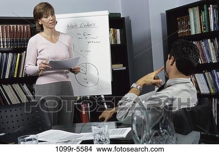 meeting, presentation, business, Middle-aged, Caucasian, casual dress, businesspeople View Large Photo Image Picture - meeting, presentation, business, Middle-aged, Caucasian, casual dress, businesspeople. Fotosearch