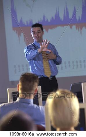 Stock Image - meeting, presentation, business, computers, education, indoors, seminar. Fotosearch