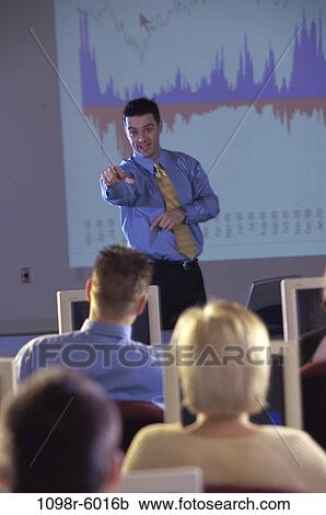 Stock Image - meeting, presentation, business, computers, education, indoors, seminar. Fotosearch