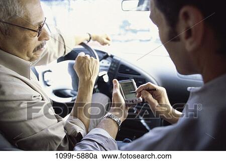 Stock Image - men, computer, car, business, using, businessmen, travel. Fotosearch