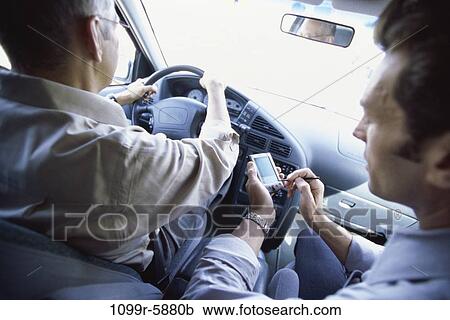men, computer, car, driving, business, outdoors, using View Large Photo Image Stock Image - men, computer, car, driving, business, outdoors, using. Fotosearch