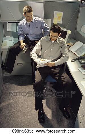 Stock Image - men, desk, business, teamwork, casual, businessman, indoors. Fotosearch