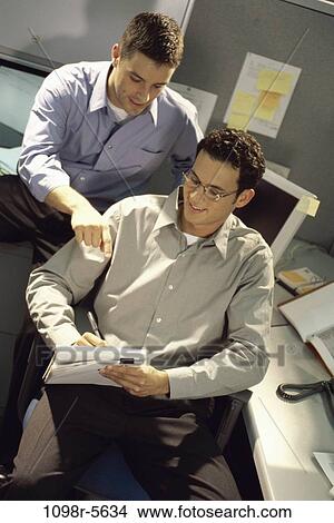 men, desk, business, teamwork, businessmen, casual, indoors View Large Photo Image Picture - men, desk, business, teamwork, businessmen, casual, indoors. Fotosearch