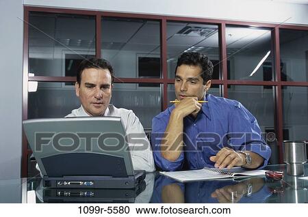 men, desk, computer, laptop, concentrating, business, Middle-aged View Large Photo Image Stock Image - men, desk, computer, laptop, concentrating, business, Middle-aged. Fotosearch
