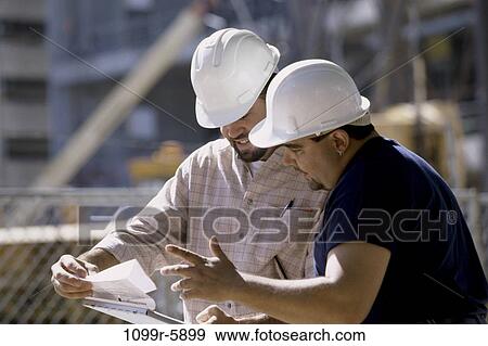 men, industry, construction, talking, concentrating, plans, Middle-aged View Large Photo Image Stock Photo - men, industry, construction, talking, concentrating, plans, Middle-aged. Fotosearch