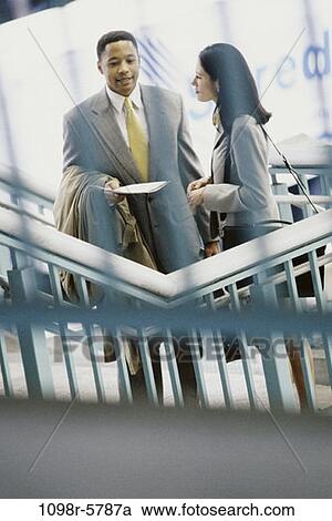 multiethnic, blur, stairs, coat, briefcase, coworkers, talking View Large Photo Image Stock Image - multiethnic, blur, stairs, coat, briefcase, coworkers, talking. Fotosearch