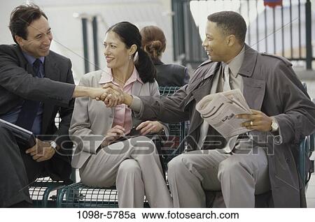 multiethnic, hands, smiling, newspaper, sitting, business View Large Photo Image Stock Image - multiethnic, hands, smiling, newspaper, sitting, business. Fotosearch