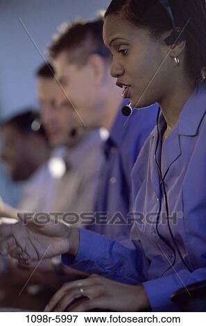 multiethnic, headset, talking, business, Middle-aged, casual, customer service View Large Photo Image Stock Photo - multiethnic, headset, talking, business, Middle-aged, casual, customer service. Fotosearch
