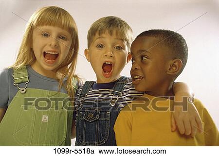 Stock Image - multiethnic, people, friends, surprise, children, indoors, kids. Fotosearch