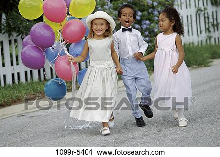 multiethnic, people, party, formal, walking, balloons, outdoors View Large Photo Image Picture - multiethnic, people, party, formal, walking, balloons, outdoors. Fotosearch