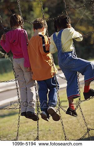 multiethnic, people, playing, climbing, outdoors, children, play View Large Photo Image Picture - multiethnic, people, playing, climbing, outdoors, children, play. Fotosearch