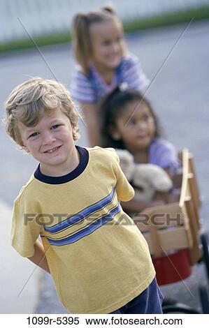 multiethnic, people, playing, riding, outdoors, pulling, friends View Large Photo Image Stock Photography - multiethnic, people, playing, riding, outdoors, pulling, friends. Fotosearch