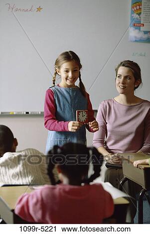 multiethnic, people, teacher, school, classroom, showing, education View Large Photo Image Stock Image - multiethnic, people, teacher, school, classroom, showing, education. Fotosearch