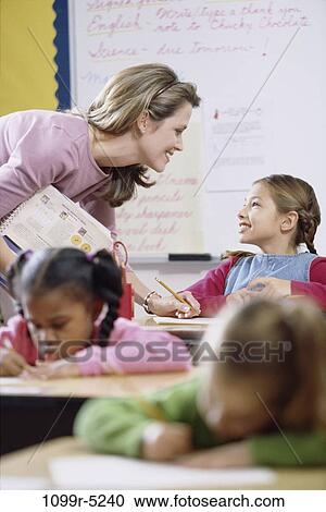 multiethnic, people, teacher, school, classroom, studying, writing View Large Photo Image Stock Image - multiethnic, people, teacher, school, classroom, studying, writing. Fotosearch
