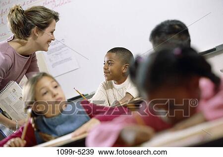 multiethnic, people, teacher, school, classroom, studying, education View Large Photo Image Stock Photo - multiethnic, people, teacher, school, classroom, studying, education. Fotosearch