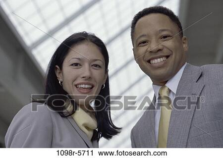 multiethnic, smiling, coworkers, business, happiness, indoors View Large Photo Image Stock Image - multiethnic, smiling, coworkers, business, happiness, indoors. Fotosearch