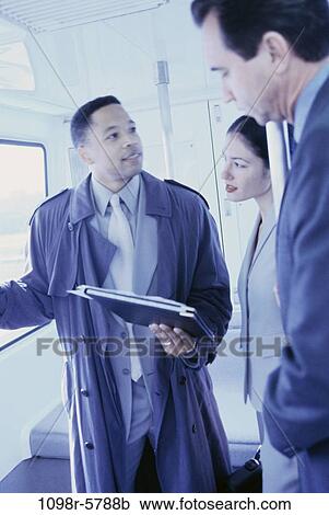 multiethnic, talking, train, business, Middle-aged, travel, talk View Large Photo Image Stock Image - multiethnic, talking, train, business, Middle-aged, travel, talk. Fotosearch