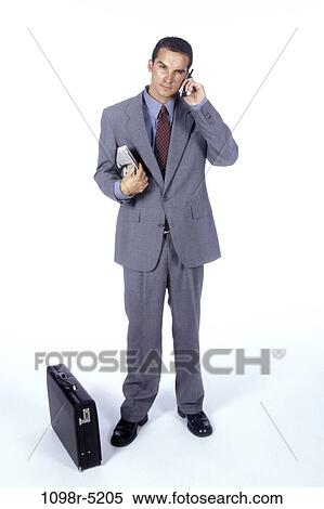 newspaper, briefcase, talking, Hispanic, phone, business View Large Photo Image Stock Photography - newspaper, briefcase, talking, Hispanic, phone, business. Fotosearch