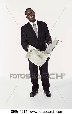 newspaper, eyeglasses, reading, business, businessman, indoors View Large Photo Image Stock Photography - newspaper, eyeglasses, reading, business, businessman, indoors. Fotosearch