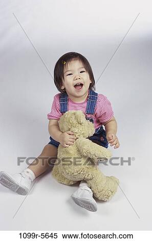 people, Asian, baby, toy, brunette, indoors, Babies playthings View Large Photo Image Stock Photography - people, Asian, baby, toy, brunette, indoors, Babies playthings. Fotosearch