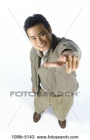 people, Asian, pointing, point, aerial, brunette View Large Photo Image Stock Image - people, Asian, pointing, point, aerial, brunette. Fotosearch