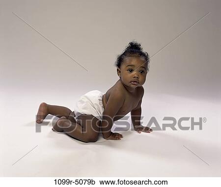 people, baby, crawling, brunette, indoors, African-American, crawl View Large Photo Image Stock Image - people, baby, crawling, brunette, indoors, African-American, crawl. Fotosearch