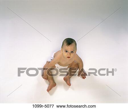 Stock Photo - people, baby, frustrated, brunette, indoors, Caucasian, Babies various. Fotosearch