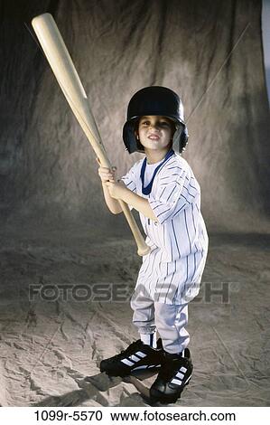 people, bat, helmet, baseball, boy, indoors, player View Large Photo Image Stock Image - people, bat, helmet, baseball, boy, indoors, player. Fotosearch