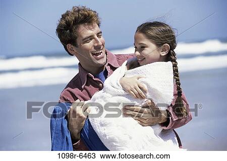 people, beach, family, father, daughter, brunette View Large Photo Image Stock Image - people, beach, family, father, daughter, brunette. Fotosearch