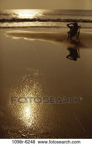 people, blur, woman, isolation, beach, tranquility, relaxing View Large Photo Image Stock Photo - people, blur, woman, isolation, beach, tranquility, relaxing. Fotosearch