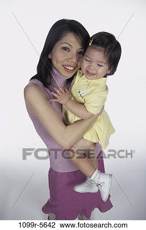 people, Brown, Asian, mother, family, daughter, parent View Large Photo Image Stock Image - people, Brown, Asian, mother, family, daughter, parent. Fotosearch