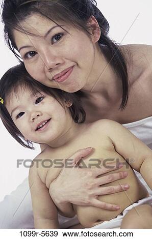 people, Brown, Asian, mother, family, portrait, parent View Large Photo Image Stock Photo - people, Brown, Asian, mother, family, portrait, parent. Fotosearch