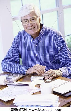 people, calculator, eyeglasses, senior, finance, personal finance View Large Photo Image Stock Photograph - people, calculator, eyeglasses, senior, finance, personal finance. Fotosearch