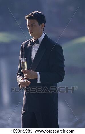 people, champagne, outdoors, serious, wedding, brunette View Large Photo Image Stock Photography - people, champagne, outdoors, serious, wedding, brunette. Fotosearch