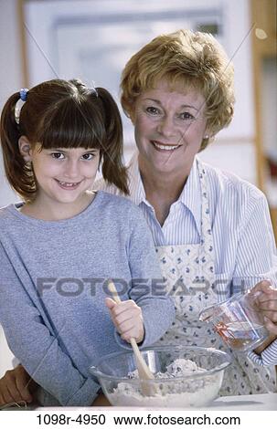 people, cooking, pouring, bowl, family, kitchen, food preparation View Large Photo Image Stock Image - people, cooking, pouring, bowl, family, kitchen, food preparation. Fotosearch