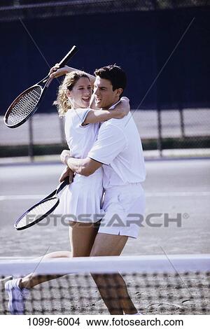 people, couple, excitement, excited, tennis, outdoors, sports View Large Photo Image Picture - people, couple, excitement, excited, tennis, outdoors, sports. Fotosearch