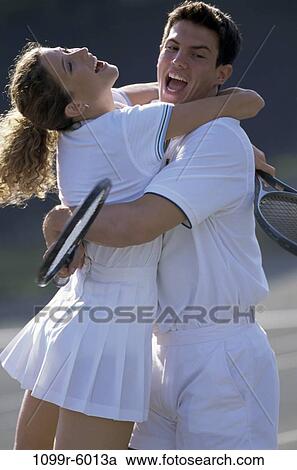 people, couple, excitement, excited, tennis, outdoors, sports View Large Photo Image Stock Image - people, couple, excitement, excited, tennis, outdoors, sports. Fotosearch
