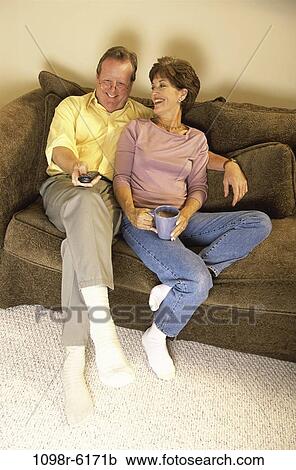 people, couple, eyeglasses, watch, Middle-aged, watching, television View Large Photo Image Stock Image - people, couple, eyeglasses, watch, Middle-aged, watching, television. Fotosearch