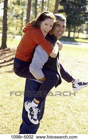 people, couple, Hispanic, outdoors, Middle-aged, romance, brunette View Large Photo Image Stock Image - people, couple, Hispanic, outdoors, Middle-aged, romance, brunette. Fotosearch