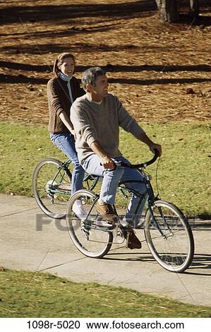 people, couple, Hispanic, outdoors, Middle-aged, bicycles, cycling View Large Photo Image Stock Image - people, couple, Hispanic, outdoors, Middle-aged, bicycles, cycling. Fotosearch