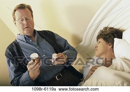 people, couple, medicine, Middle-aged, illness, caring, sick View Large Photo Image Stock Image - people, couple, medicine, Middle-aged, illness, caring, sick. Fotosearch