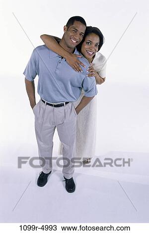 people, couple, Middle-aged, embracing, embrace, brunette, indoors View Large Photo Image Stock Image - people, couple, Middle-aged, embracing, embrace, brunette, indoors. Fotosearch