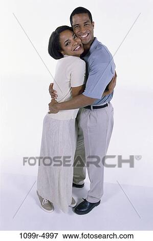 Stock Photo - people, couple, Middle-aged, embracing, romance, embrace, brunette. Fotosearch