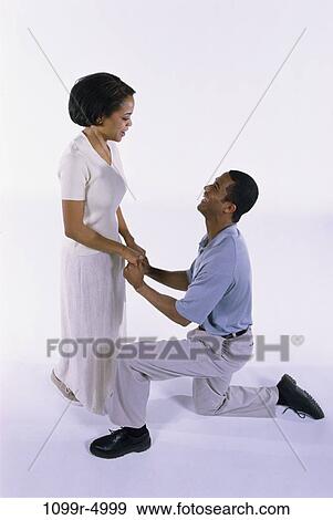 people, couple, Middle-aged, commitment, romance, brunette, indoors View Large Photo Image Stock Photo - people, couple, Middle-aged, commitment, romance, brunette, indoors. Fotosearch